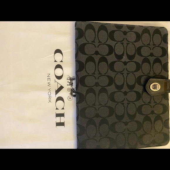Genuine Coach IPad Cover with signature C fabric and patent leather details.